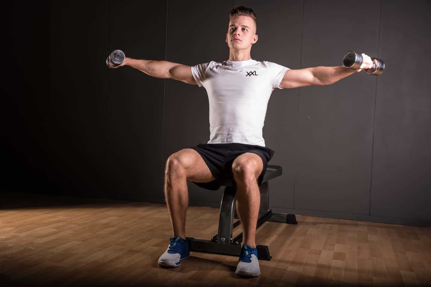 Seated dumbbell side raise