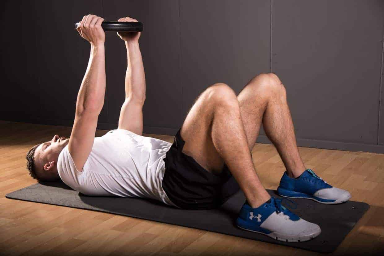 Weighted crunch (arms straight)