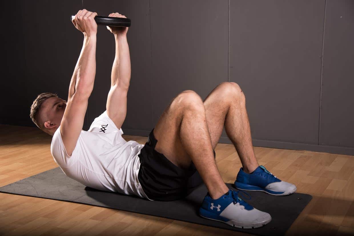 Weighted crunch (arms straight)